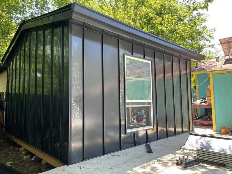 Black standing seam metal wall panels for Metal Roof Installation in Rathdrum