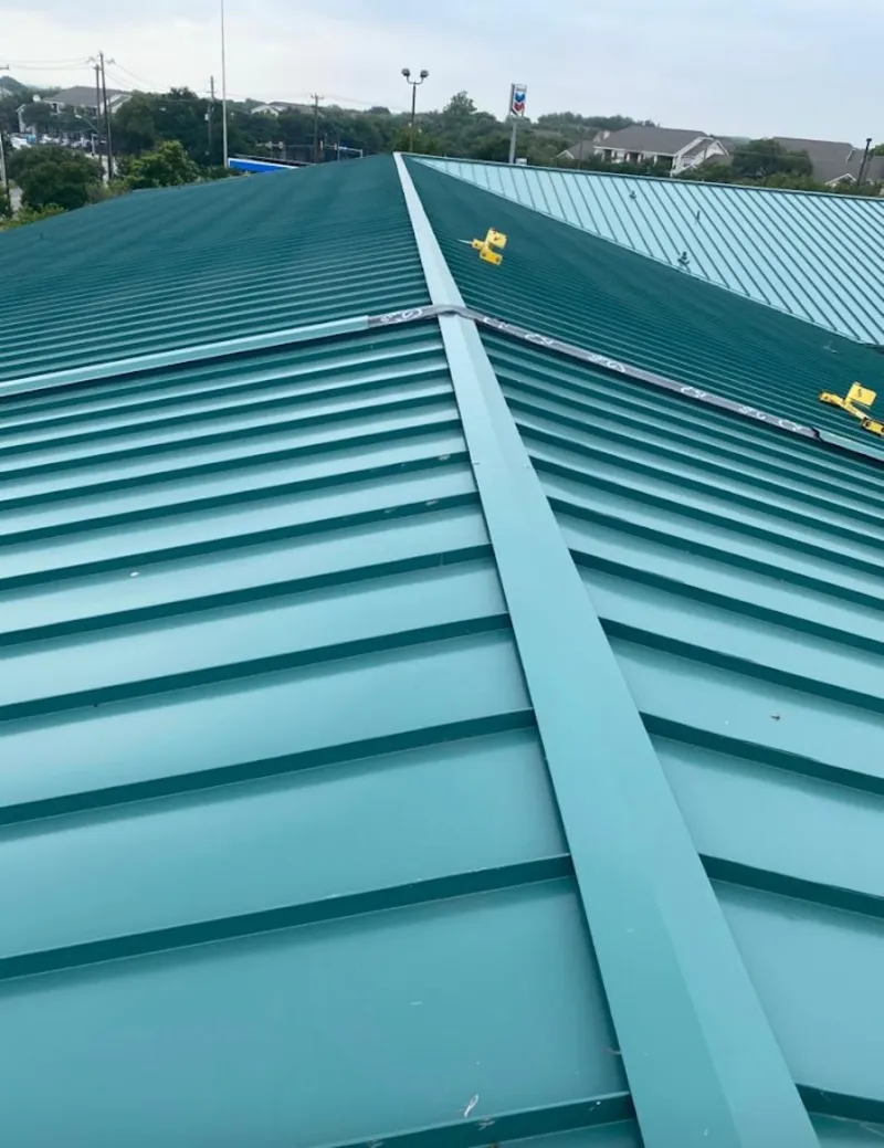 Green commercial metal roof ridge and valley for Metal Roof Repair in Rathdrum