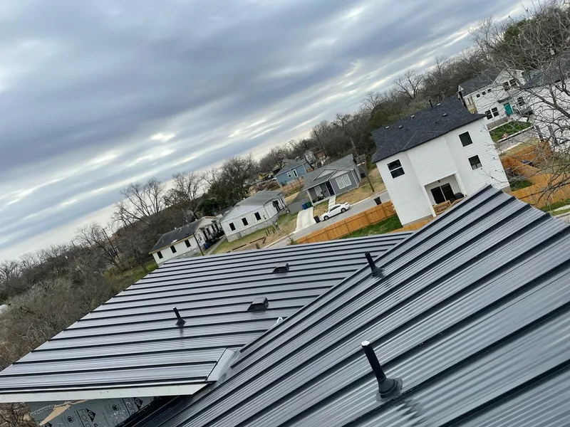 Standing seam metal roof panels with vents for Skylight Repair in Rathdrum